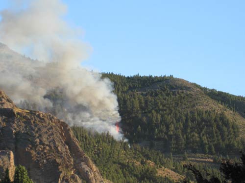 Wild fire started in the mountains above the town of Esquel
